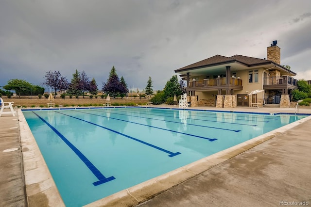 24748 E Layton Pl, Aurora, CO 80016 - community pool featuring a patio