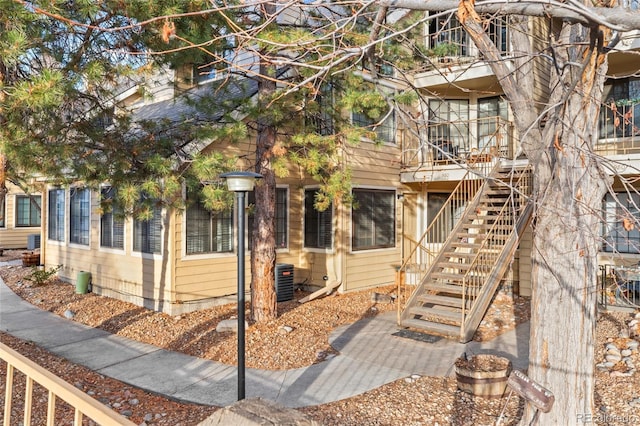 view of front of house with stairway