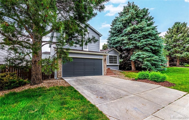 10172 Woodrose Ln, Highlands Ranch, CO 80129 - view of front of property with brick siding, a garage, and driveway