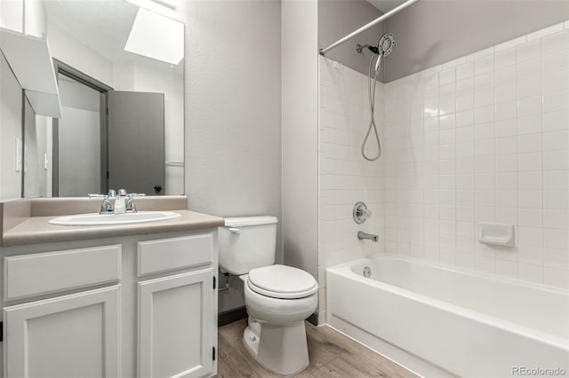 10172 Woodrose Ln, Highlands Ranch, CO 80129 - bathroom with wood finished floors, vanity, and shower / washtub combination