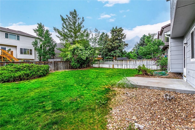 10172 Woodrose Ln, Highlands Ranch, CO 80129 - fenced backyard with a patio