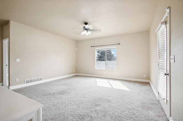 unfurnished bedroom featuring ceiling fan and light colored carpet