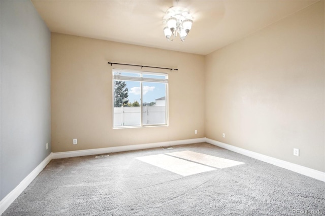 view of carpeted spare room