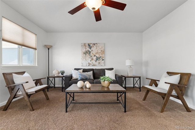 living room with carpet flooring and ceiling fan