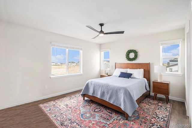 5805 Red Barn Ave, Longmont, CO 80504 - bedroom featuring wood finished floors, baseboards, and ceiling fan