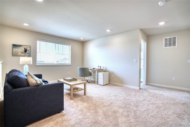 5805 Red Barn Ave, Longmont, CO 80504 - living area featuring light colored carpet, recessed lighting, and baseboards