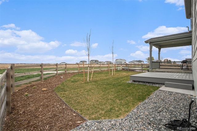 5805 Red Barn Ave, Longmont, CO 80504 - view of yard with a wooden deck