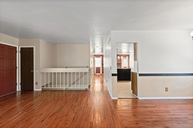 4627 S Norfolk Way, Aurora, CO 80015 - empty room featuring hardwood / wood-style floors and baseboards