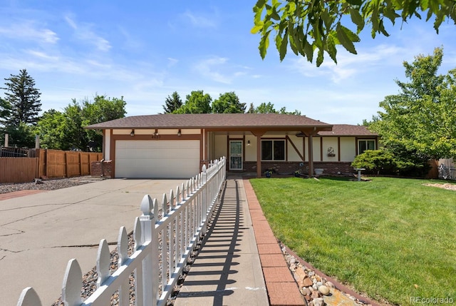 4627 S Norfolk Way, Aurora, CO 80015 - single story home featuring a garage, driveway, and brick siding