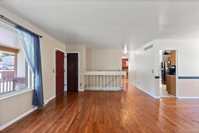 4627 S Norfolk Way, Aurora, CO 80015 - spare room with hardwood / wood-style flooring and a ceiling fan