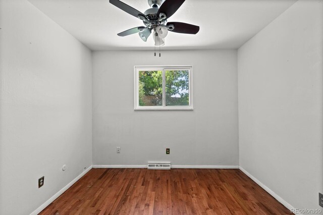 4627 S Norfolk Way, Aurora, CO 80015 - empty room featuring ceiling fan and wood finished floors