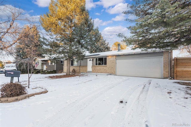 ranch-style home with a garage