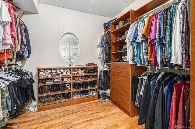 6940 Saddleback Ave, Firestone, CO 80504 - walk in closet with wood finished floors