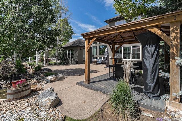 6940 Saddleback Ave, Firestone, CO 80504 - view of patio / terrace featuring a gazebo and a deck