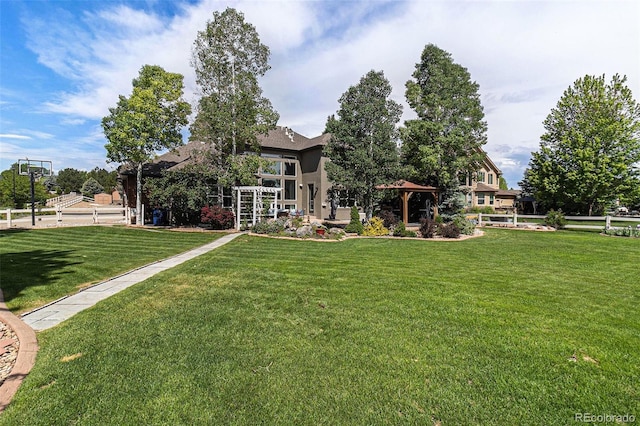 6940 Saddleback Ave, Firestone, CO 80504 - rear view of property with a gazebo and a yard