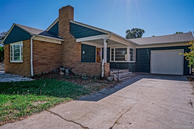 view of front of home with a garage