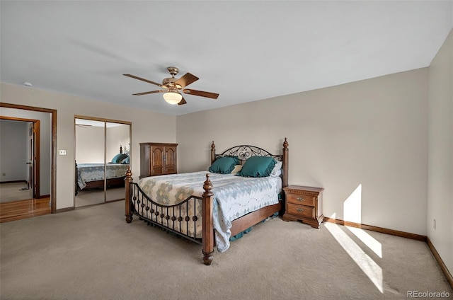 723 Orion Dr, Colorado Springs, CO 80906 - bedroom with light colored carpet, baseboards, a closet, and ceiling fan