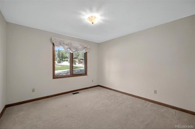 723 Orion Dr, Colorado Springs, CO 80906 - unfurnished room featuring light carpet and baseboards