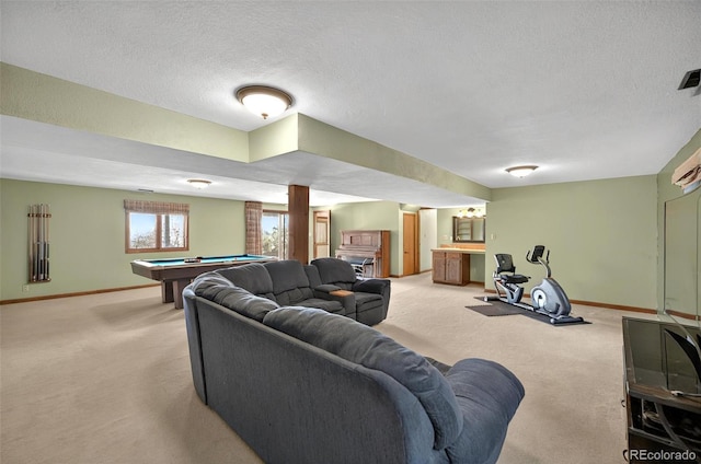 723 Orion Dr, Colorado Springs, CO 80906 - living room featuring light carpet, pool table, baseboards, and a textured ceiling