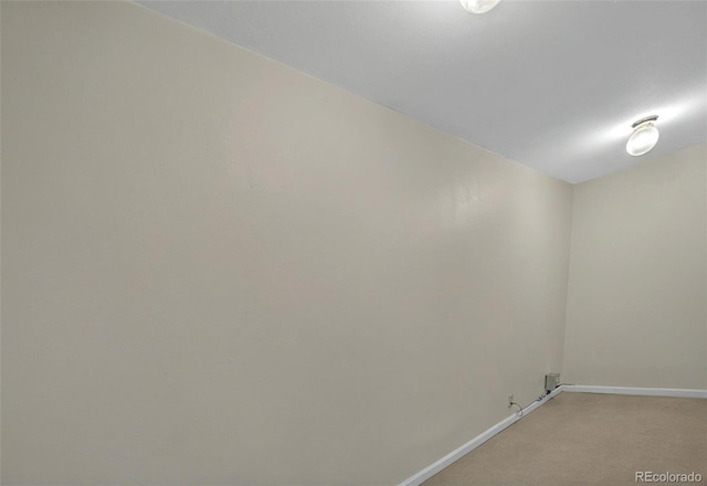 723 Orion Dr, Colorado Springs, CO 80906 - unfurnished room with baseboards and light colored carpet
