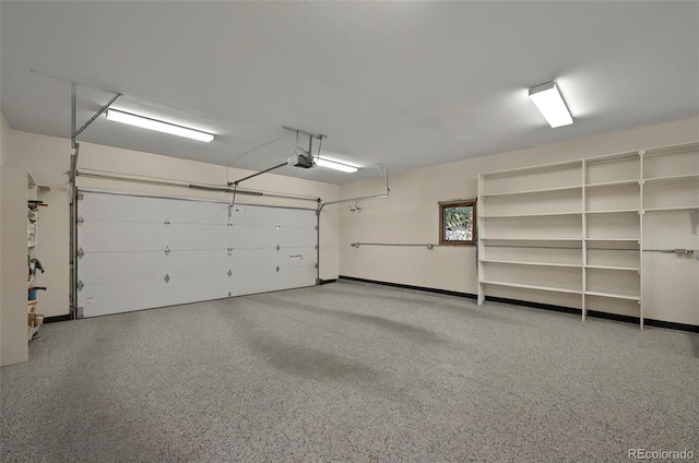 723 Orion Dr, Colorado Springs, CO 80906 - garage featuring a garage door opener
