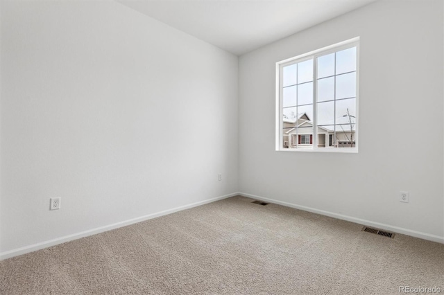 view of carpeted spare room