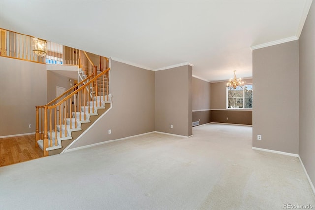 carpeted empty room with a chandelier, visible vents, baseboards, stairs, and ornamental molding