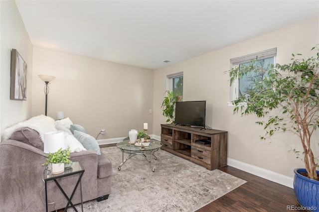 10370 Routt St, Westminster, CO 80021 - living area with baseboards and wood finished floors