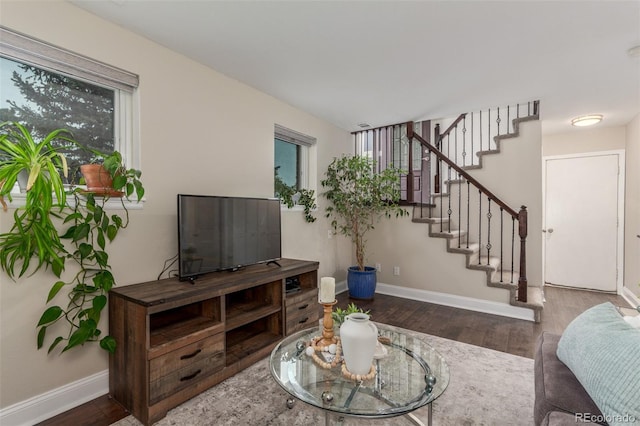 10370 Routt St, Westminster, CO 80021 - living room featuring wood finished floors, stairs, and baseboards