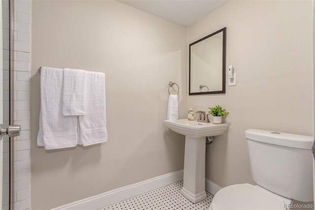 10370 Routt St, Westminster, CO 80021 - bathroom with toilet and baseboards