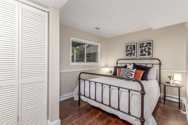 10370 Routt St, Westminster, CO 80021 - bedroom with a closet, wood-type flooring, and baseboards