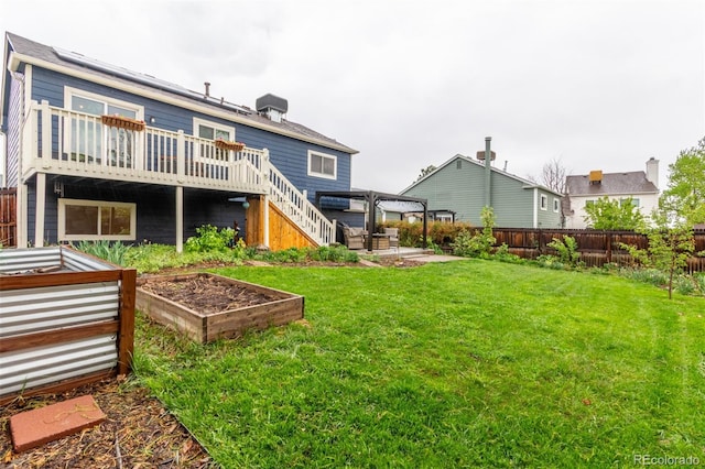 10370 Routt St, Westminster, CO 80021 - back of house with a garden, a wooden deck, and a pergola