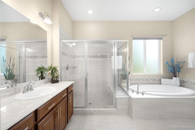 15779 W 83rd Pl, Arvada, CO 80007 - full bath with vanity, a garden tub, a shower stall, and tile patterned floors