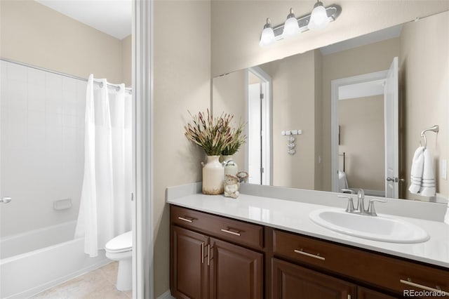15779 W 83rd Pl, Arvada, CO 80007 - bathroom featuring toilet, vanity, shower / tub combo with curtain, and tile patterned floors