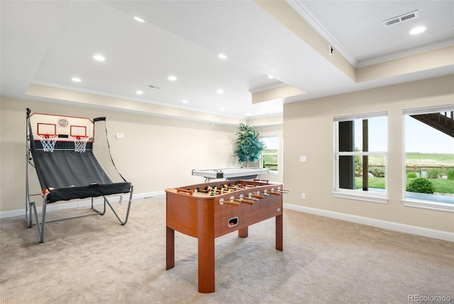 15779 W 83rd Pl, Arvada, CO 80007 - rec room with ornamental molding, a raised ceiling, light colored carpet, baseboards, and recessed lighting
