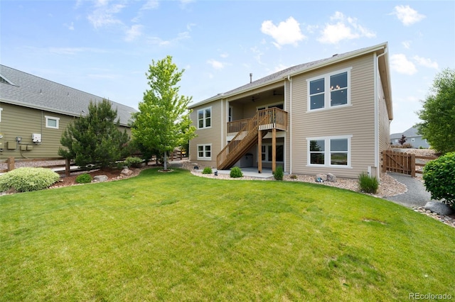 15779 W 83rd Pl, Arvada, CO 80007 - rear view of house featuring stairs, a deck, a patio, and a ceiling fan