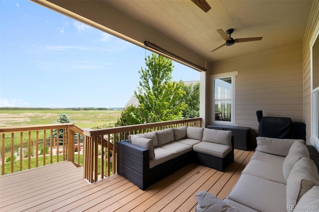 15779 W 83rd Pl, Arvada, CO 80007 - wooden terrace featuring outdoor lounge area, ceiling fan, and a view of rural / pastoral area
