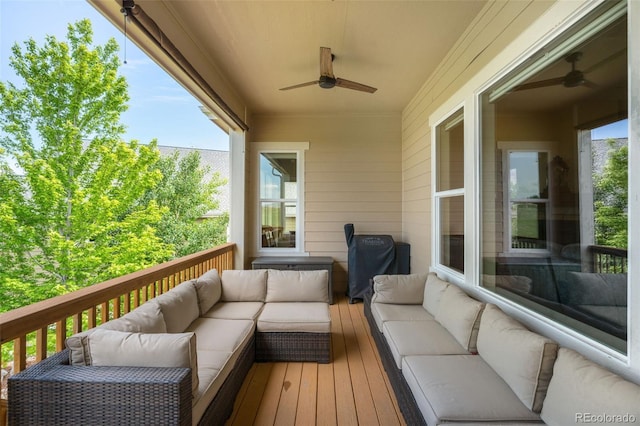 15779 W 83rd Pl, Arvada, CO 80007 - wooden terrace with an outdoor living space and ceiling fan