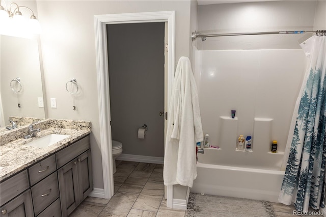 bathroom featuring toilet, vanity, baseboards, marble finish floor, and shower / bath combination with curtain