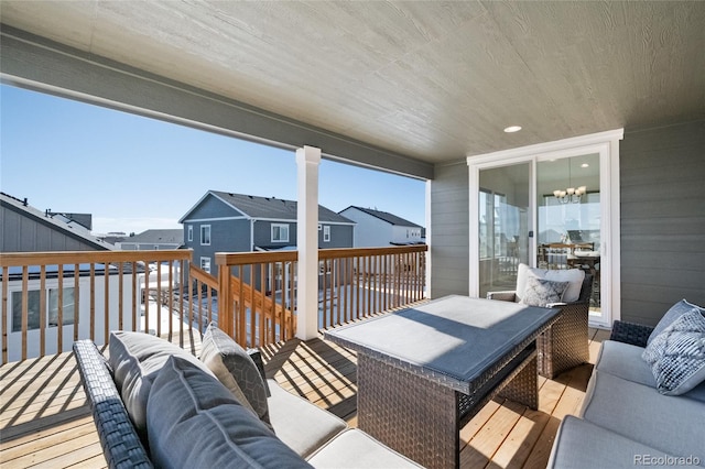 wooden deck with an outdoor hangout area