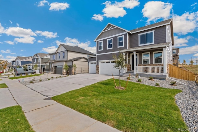 view of front of house featuring a garage, a porch, a front lawn, and a residential view