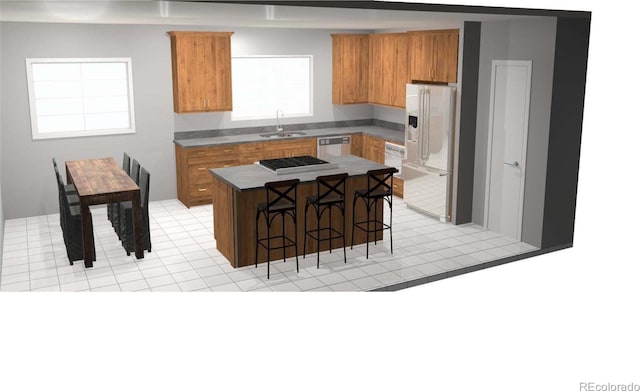 308 Creekside Aly Unit 5, Frisco, CO 80443 - kitchen featuring white refrigerator with ice dispenser, brown cabinetry, a center island, and dishwashing machine