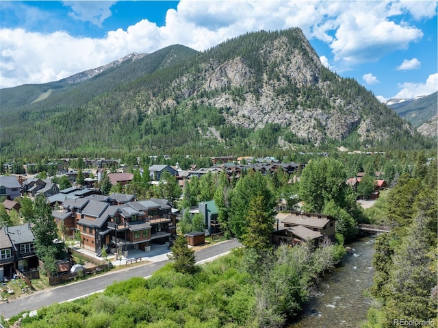 308 Creekside Aly Unit 5, Frisco, CO 80443 - view of mountain background featuring a heavily wooded area and nearby suburban area