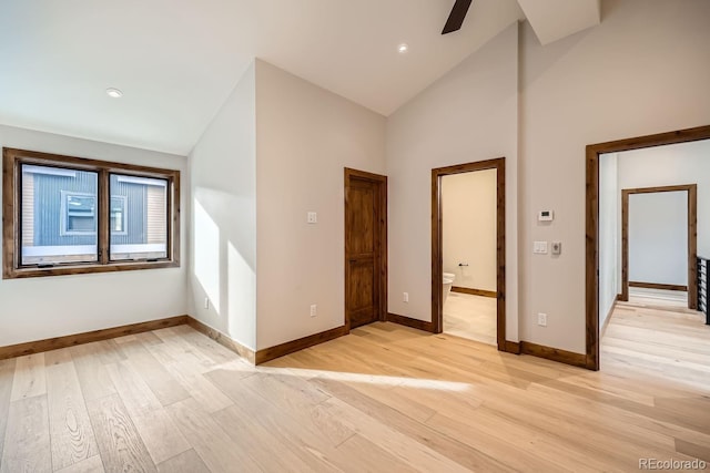 308 Creekside Aly Unit 5, Frisco, CO 80443 - interior space with light wood finished floors, a ceiling fan, high vaulted ceiling, and recessed lighting