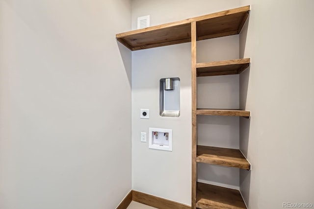 308 Creekside Aly Unit 5, Frisco, CO 80443 - laundry room with hookup for an electric dryer, hookup for a washing machine, and wood finished floors