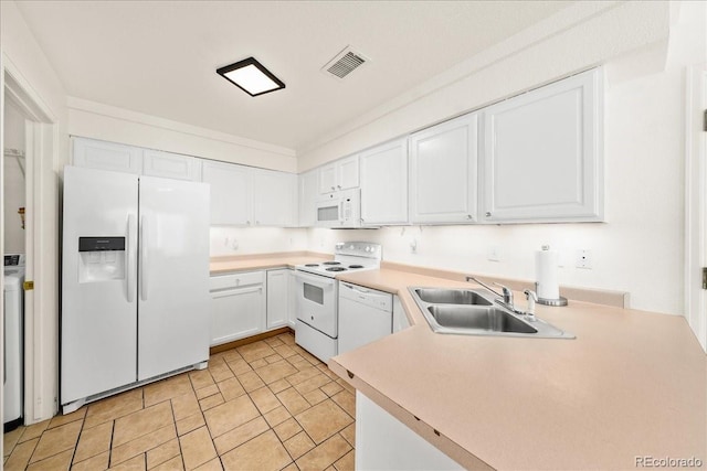 21562 E 47th Ave, Denver, CO 80249 - kitchen featuring a sink, white appliances, visible vents, white cabinetry, and light countertops