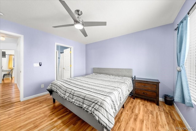 21562 E 47th Ave, Denver, CO 80249 - bedroom featuring baseboards, light wood finished floors, and ceiling fan