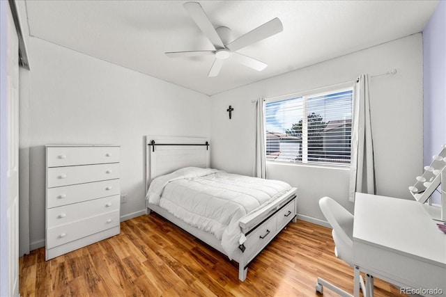 21562 E 47th Ave, Denver, CO 80249 - bedroom featuring baseboards, ceiling fan, and light wood-type flooring