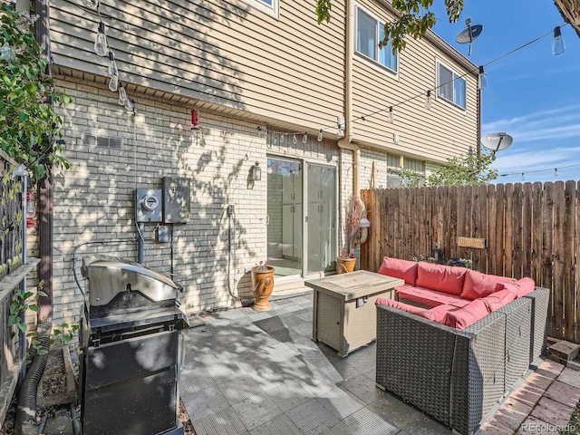 4273 W Ponds Cir, Littleton, CO 80123 - view of patio / terrace featuring outdoor lounge area, fence, and a grill