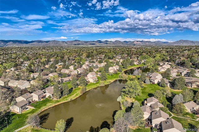 4273 W Ponds Cir, Littleton, CO 80123 - aerial perspective of suburban area featuring a water and mountain view
